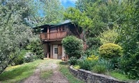 Building Photo - East AVL - Beautiful Zen Garden Apt with Sauna!