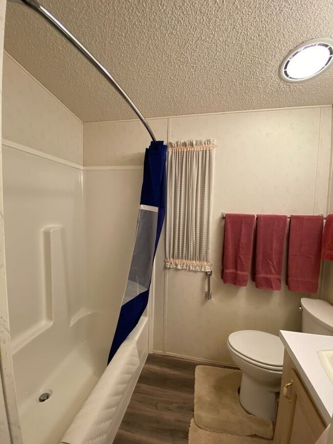 Building Photo - 55+ Park Town Home!