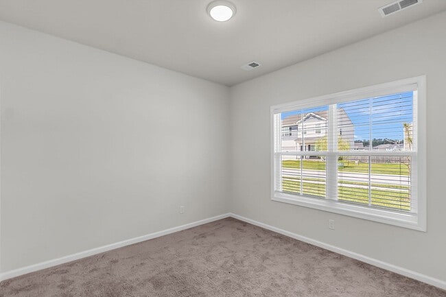 Building Photo - Spacious 4-Bedroom Home with Modern Upgrad...