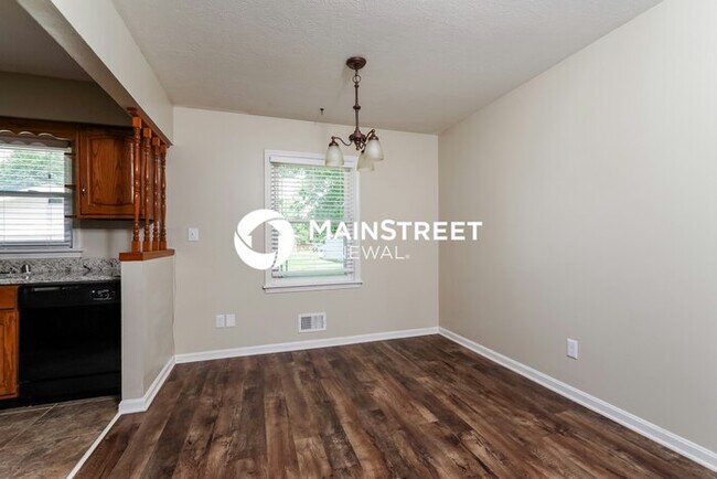 Building Photo - 8003 Canna Dr