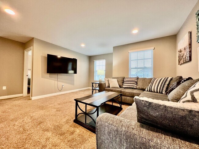 Building Photo - Executive corporate rental features community pool. Fully furnished and includes all utilities.