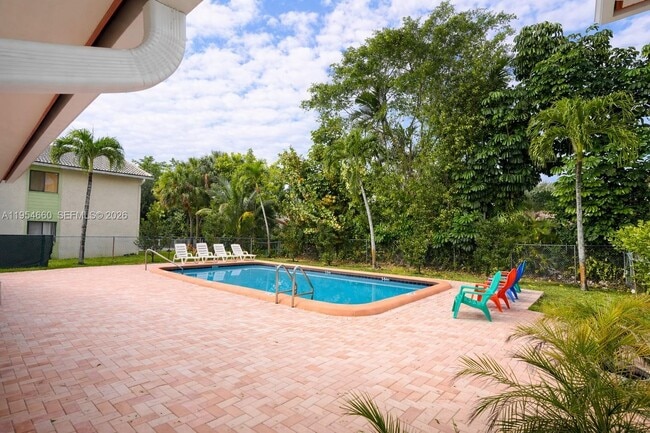 Building Photo - 3200 Coral Springs Dr