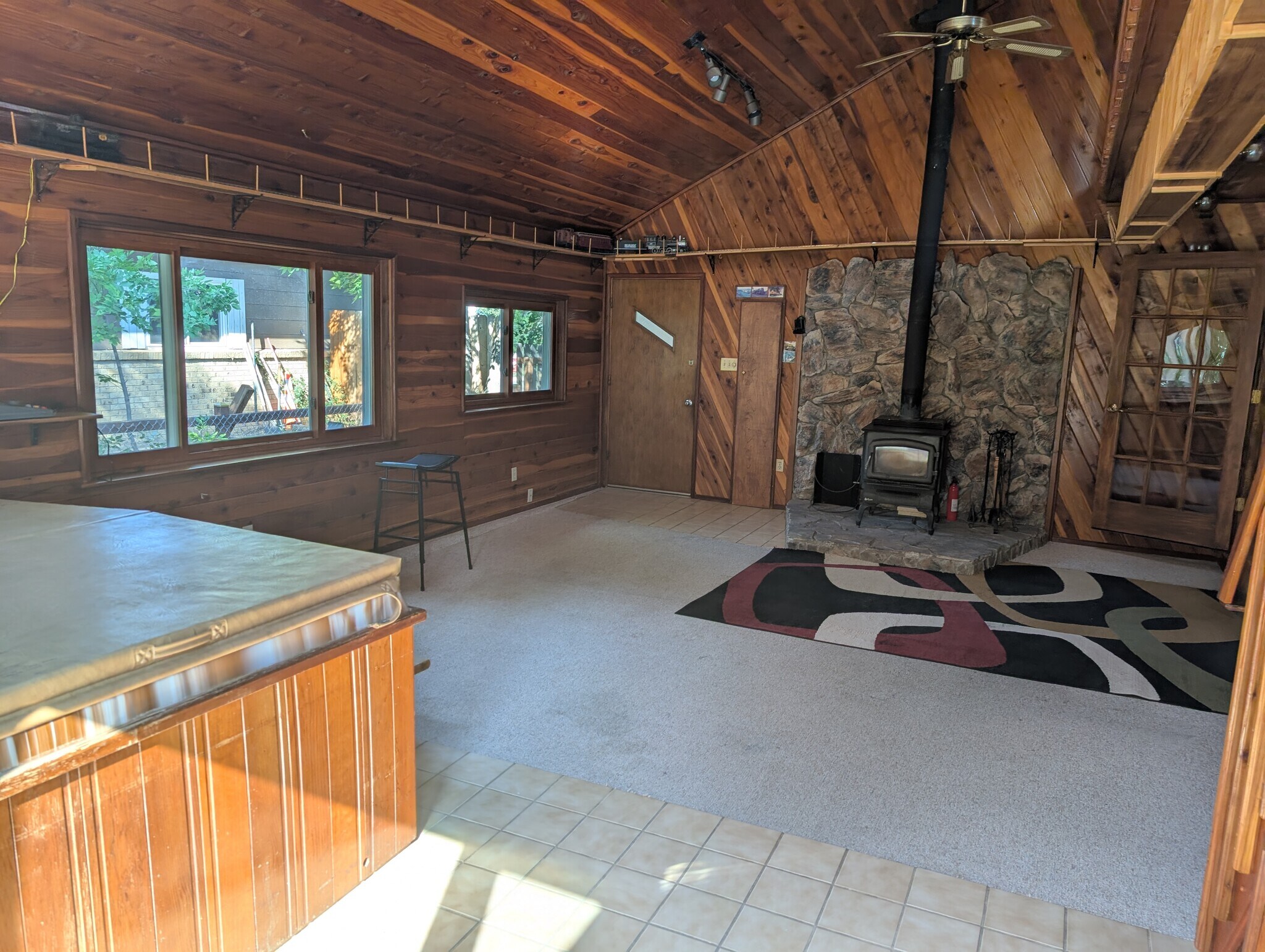fire place with door to side of house - 28 James Circle