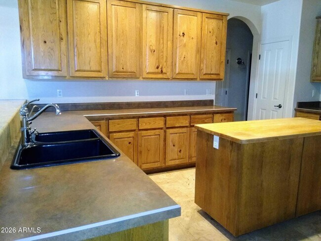 Building Photo - 242 N Pima Rd