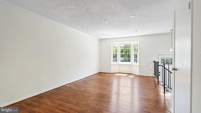 Building Photo - This stunning 3-bedroom, 2-bathroom interior townhome is sure to impress.