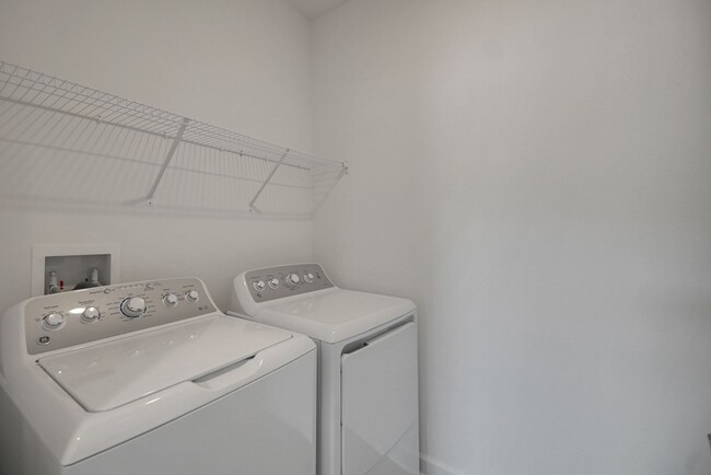 Building Photo - Stunning 4/3 in Gated Dora Parc! Water Views!