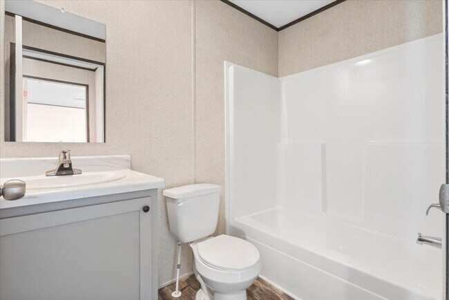 Building Photo - 6680 Hidden Oaks Dr