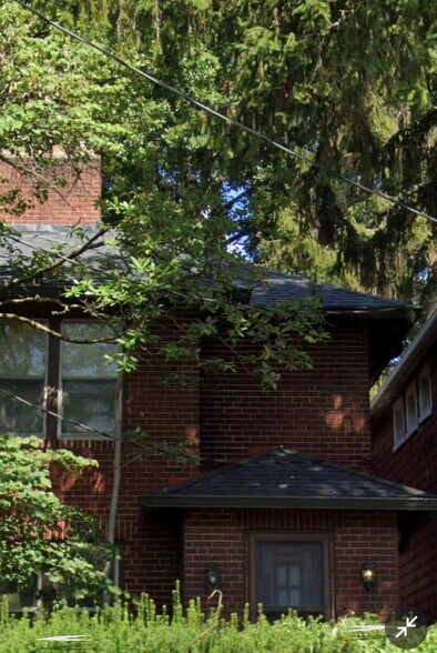 Front of building from sidewalk - 40 W Tompkins St