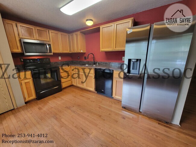 Building Photo - 002 Cozy Rambler