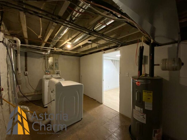 Building Photo - 2 Bed with Finished Basement, Deck off Bedroom, and Backyard