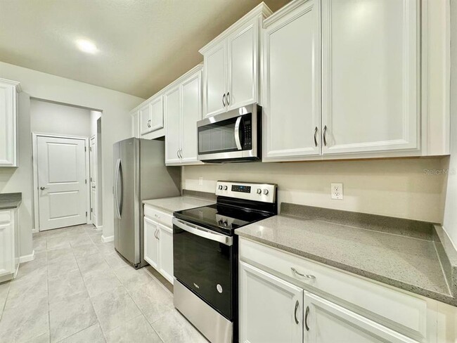 Building Photo - 8509 Primrose Willow Pl