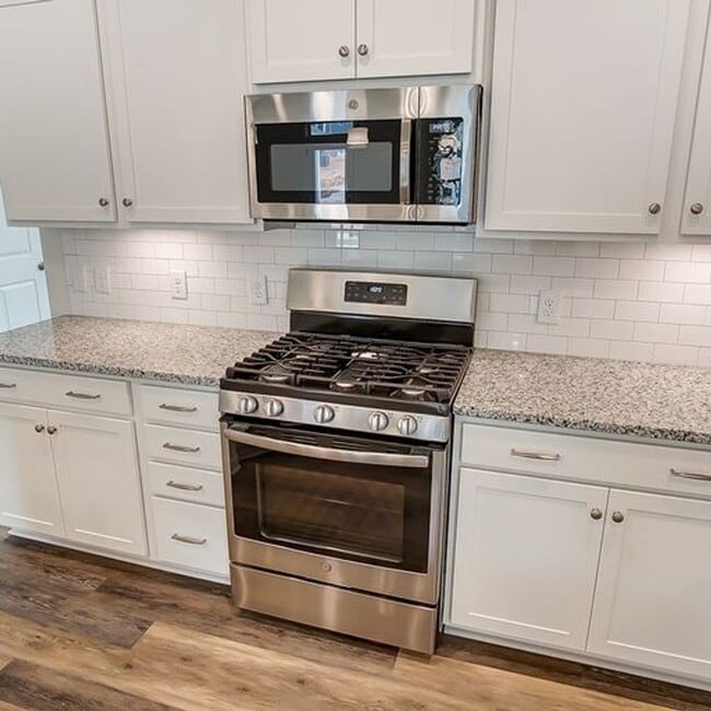 Building Photo - Move-In Ready, End Unit Two Story Townhome...