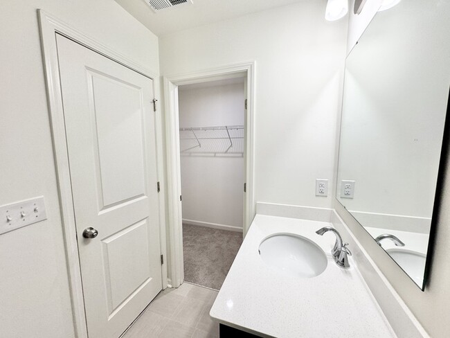 Building Photo - Three bedroom 2 1/2 at townhome close to s...