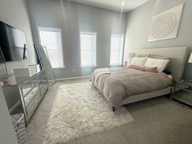 Building Photo - East District 3 BR/3.5 BA End Row Home w-Private Parking