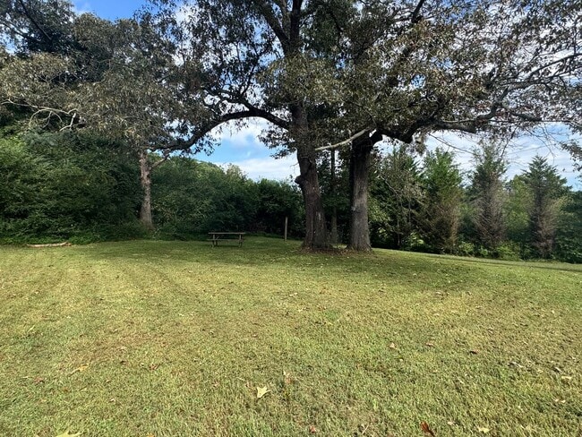 Building Photo - Spacious 3-Bedroom Home with Fenced Lot an...