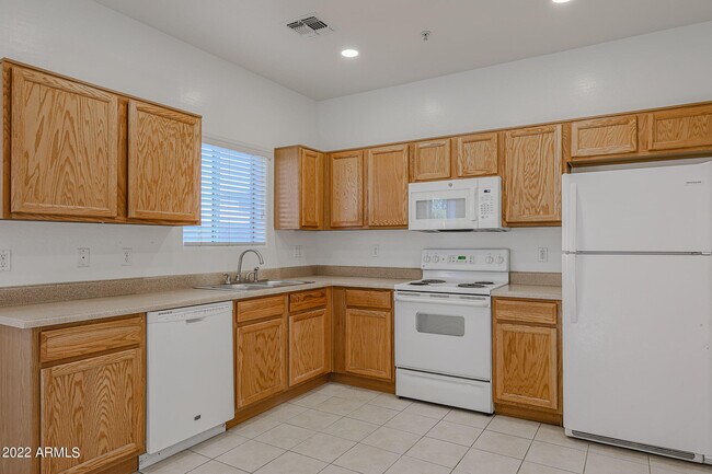 Building Photo - 8940 W Olive Ave