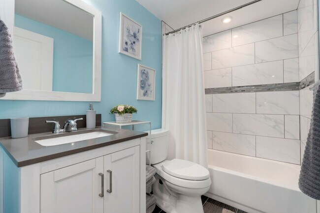 Building Photo - Evolve Real Estate: Evolve Real Estate: Meticulous Executive 4 Bedroom Plus Den Plus Finished Bas...