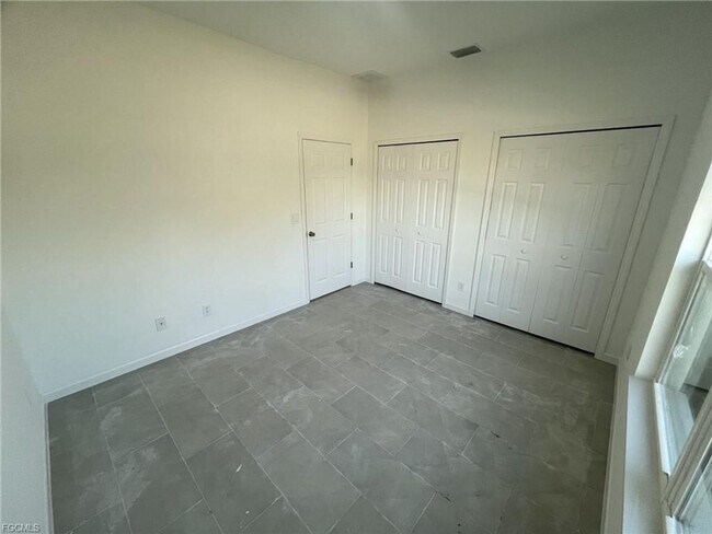 Building Photo - Brand new 2/1 -LARGE BACK YARD- LEHIGH ACRES