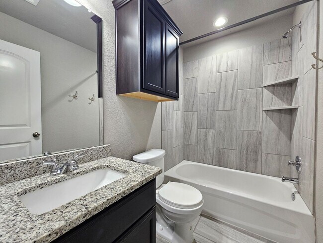 Building Photo - NEW IN MANAGEMENT - AVAILABLE NOW!