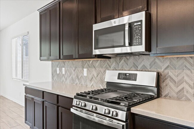 Building Photo - Spacious 5-bedroom home in gated community