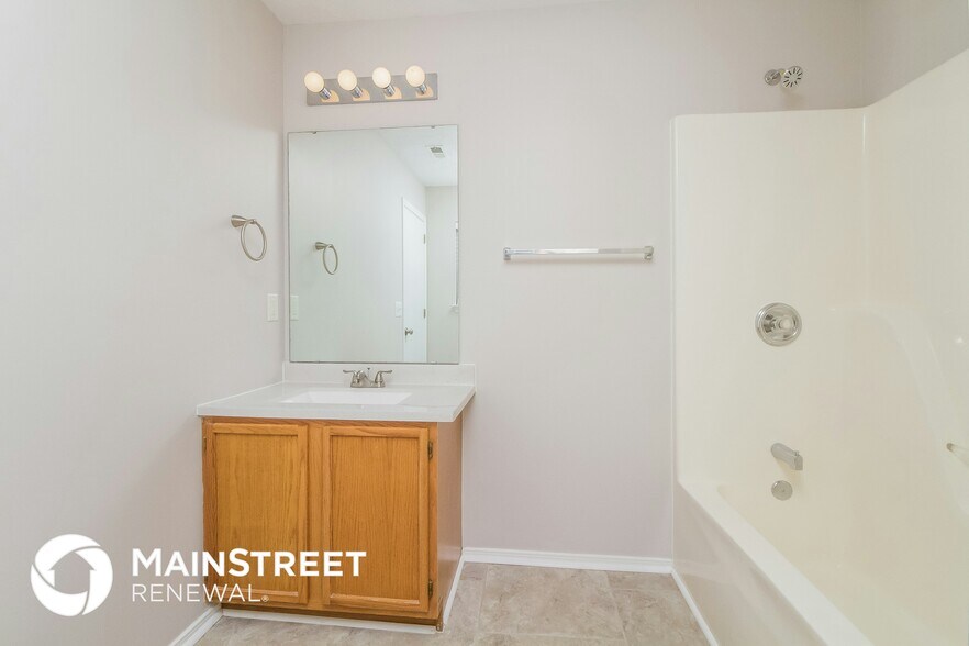 Building Photo - 7218 Hidden Lake Dr