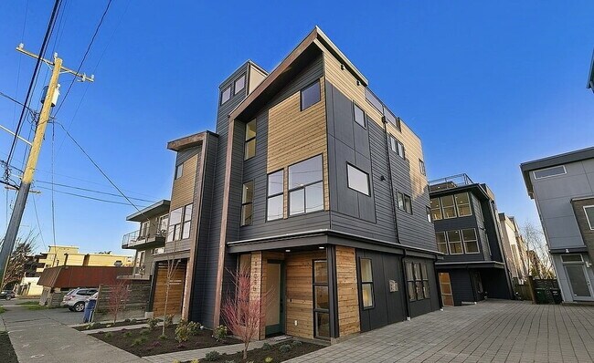 Building Photo - "Charming 3-Bedroom Gem in Seattle's Vibrant Heart - 1733 Sq. Ft. of Modern Comfort!"