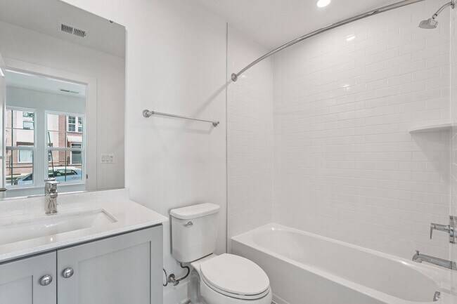 Building Photo - Brand New 4 Bedroom, 3.5 Bath Townhome in ...