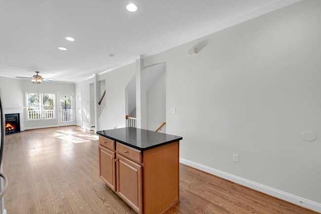 Building Photo - Wonderful craftsman style end-unit townhome