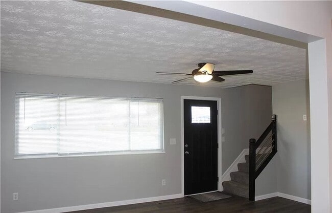 Building Photo - 4 Bedroom home with fenced in backyard and central air