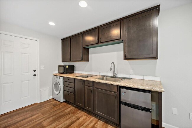 Building Photo - Beautiful Steilacoom Home with Private ADU, Covered Patio, Bonus Gym & A/C!