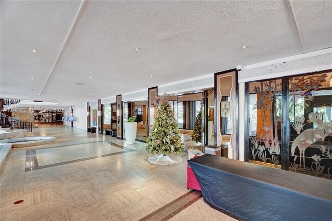 Building Photo - 5555 Collins Ave