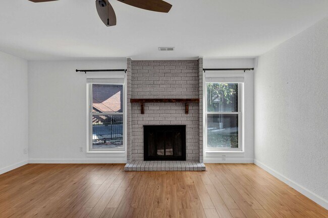 Building Photo - Spacious Poolside Condo!