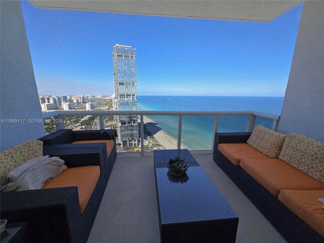 Building Photo - 18201 Collins Ave