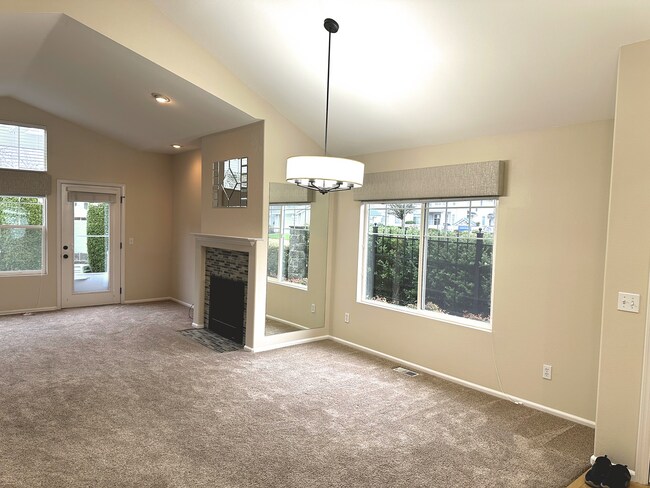 Building Photo - Elegant Gated Townhome with Main-Floor Primary Suite at Marina Pointe Kent
