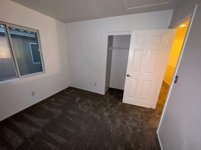 Building Photo - Fresh Paint/New Flooring all inside! Four ...
