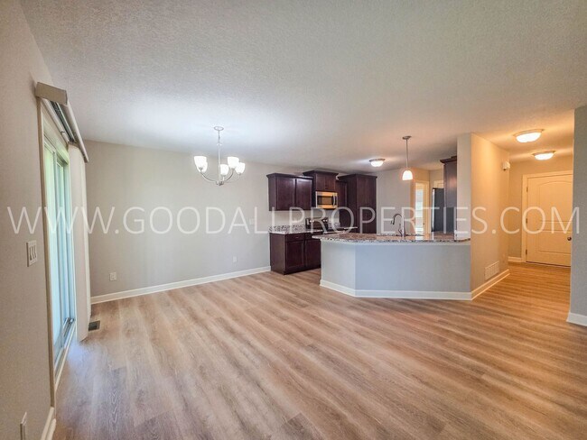 Building Photo - 4 Bed Waukee Home with Granite Counters & Covered Deck