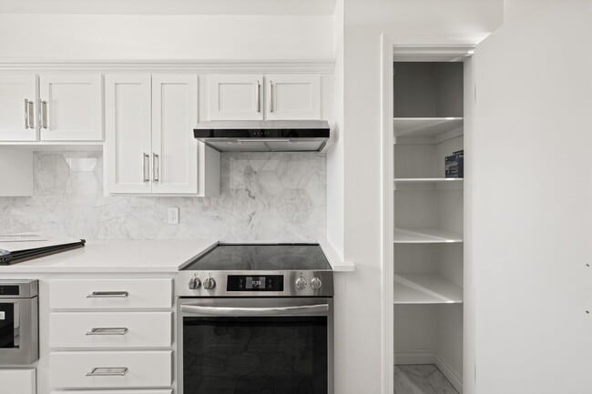 Building Photo - A modern revival of classic architecture, this Nichols Hills residence has been meticulously rebu...