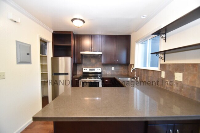 Building Photo - Bright & Peaceful 2BR Townhouse with Deck,...