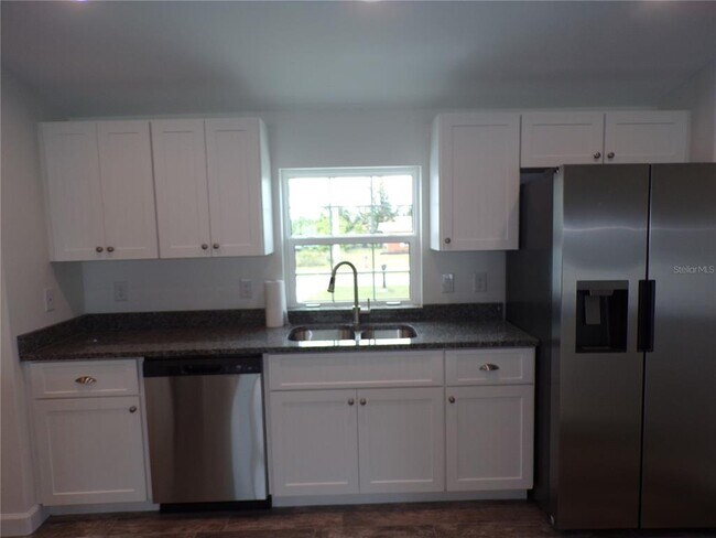 Building Photo - 3308 Port Charlotte Blvd