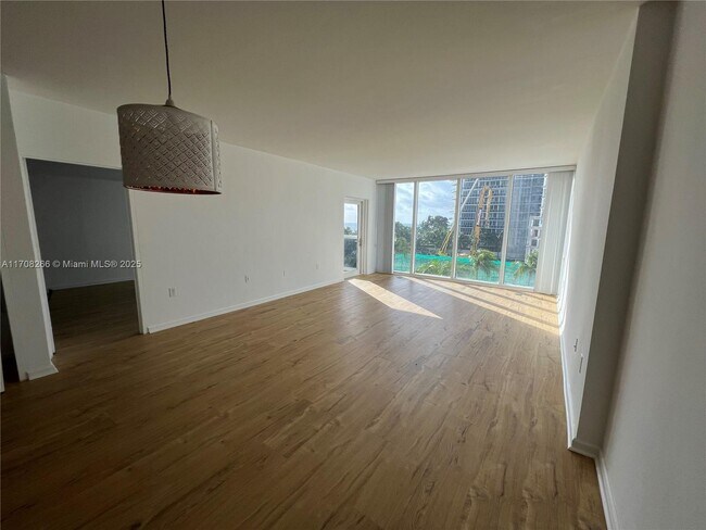 Building Photo - 10275 Collins Ave