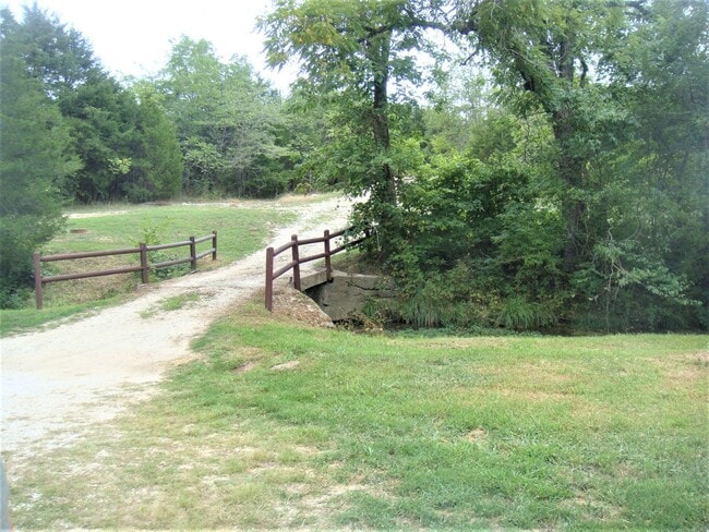 Building Photo - PRE-LEASING | Private Stone Home on Acreage Near Nixa