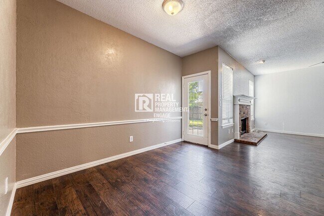 Building Photo - Recently Updated Plano Property with Modern Features and Serene Surroundings
