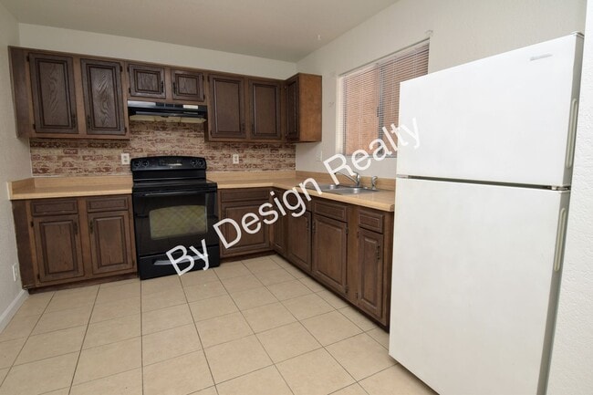 Building Photo - Updated 2 Bed 1 Bath Duplex with Fresh Paint, Ductless Heating/Cooling and Private Yard