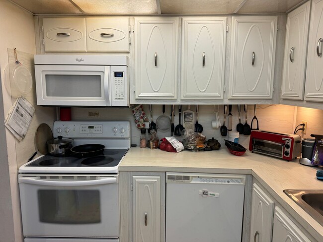 Building Photo - Furnished 2 Bedroom, 2 bath condo across f...