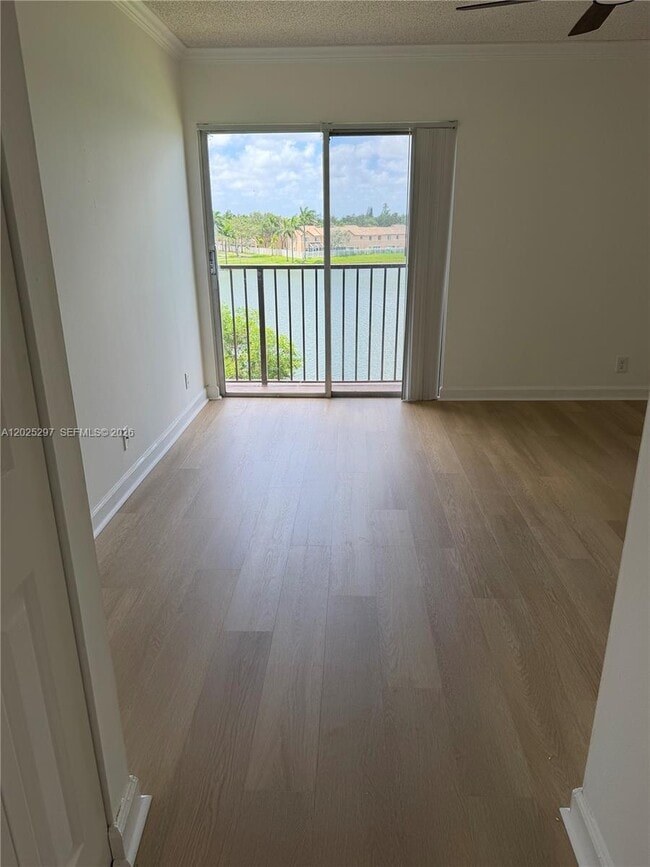 Building Photo - 8560 N Sherman Cir