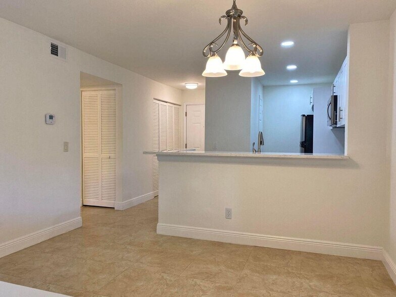 Building Photo - 1885 Palm Cove Blvd