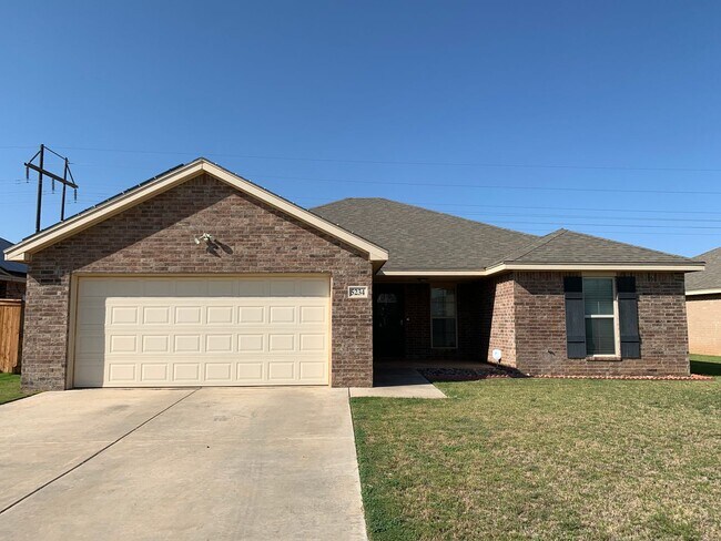 Building Photo - Solar Panels and Alarm System Included!!