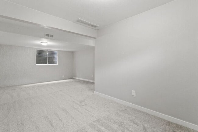 Building Photo - Freshly Renovated 4-Bedroom Home with Over...