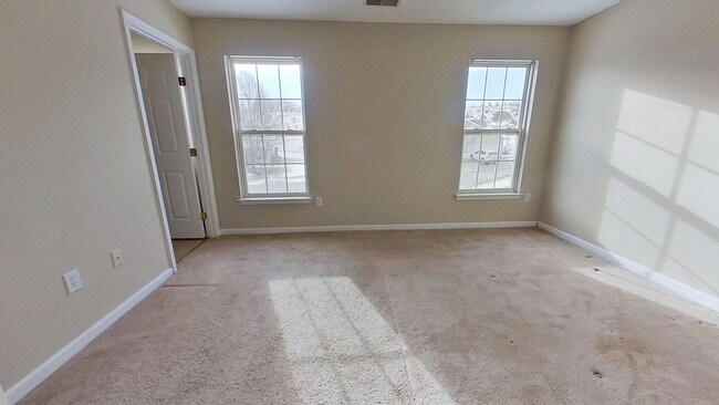 Building Photo - Spacious 3-Story Townhouse with One-Car Garage