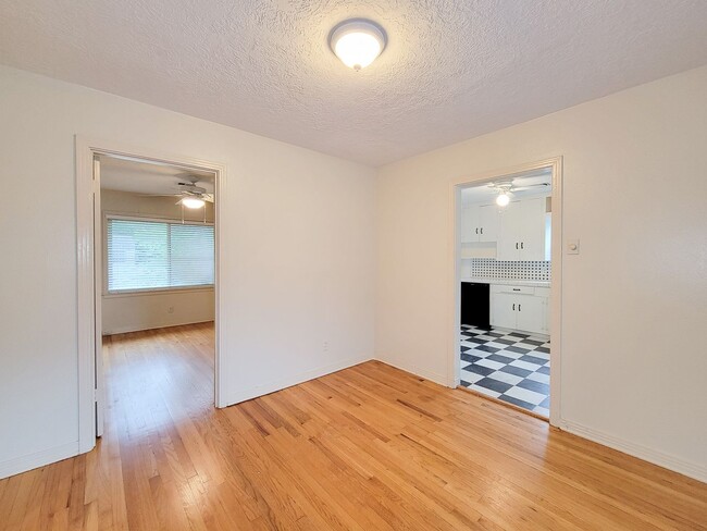 Building Photo - Step into your new home nestled in the vib...